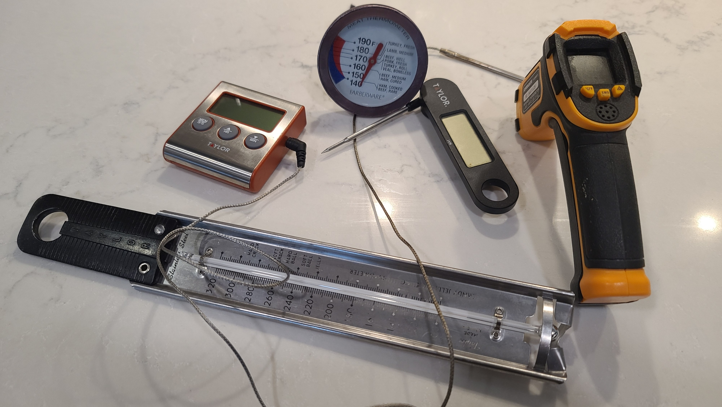 A variety of food and kitchen thermometers